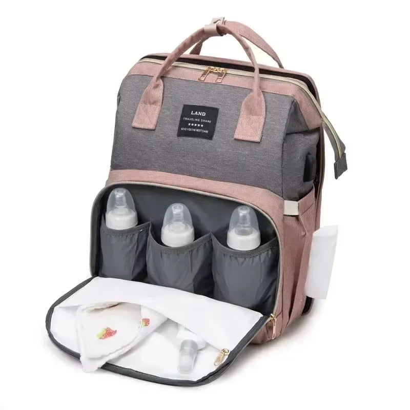 Stylish & Spacious Mommy Bag - Lightweight Folding Crib Bed & Travel Backpack for Moms on the Go!
